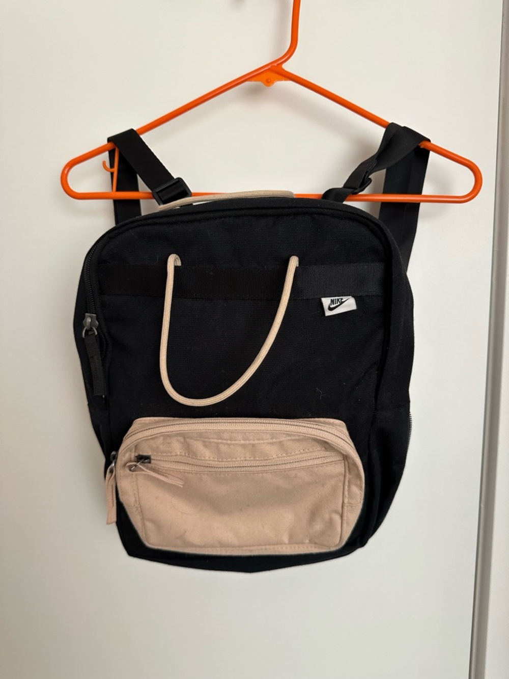 Nike Black Backpack with Beige Front Pocket and Drawstring